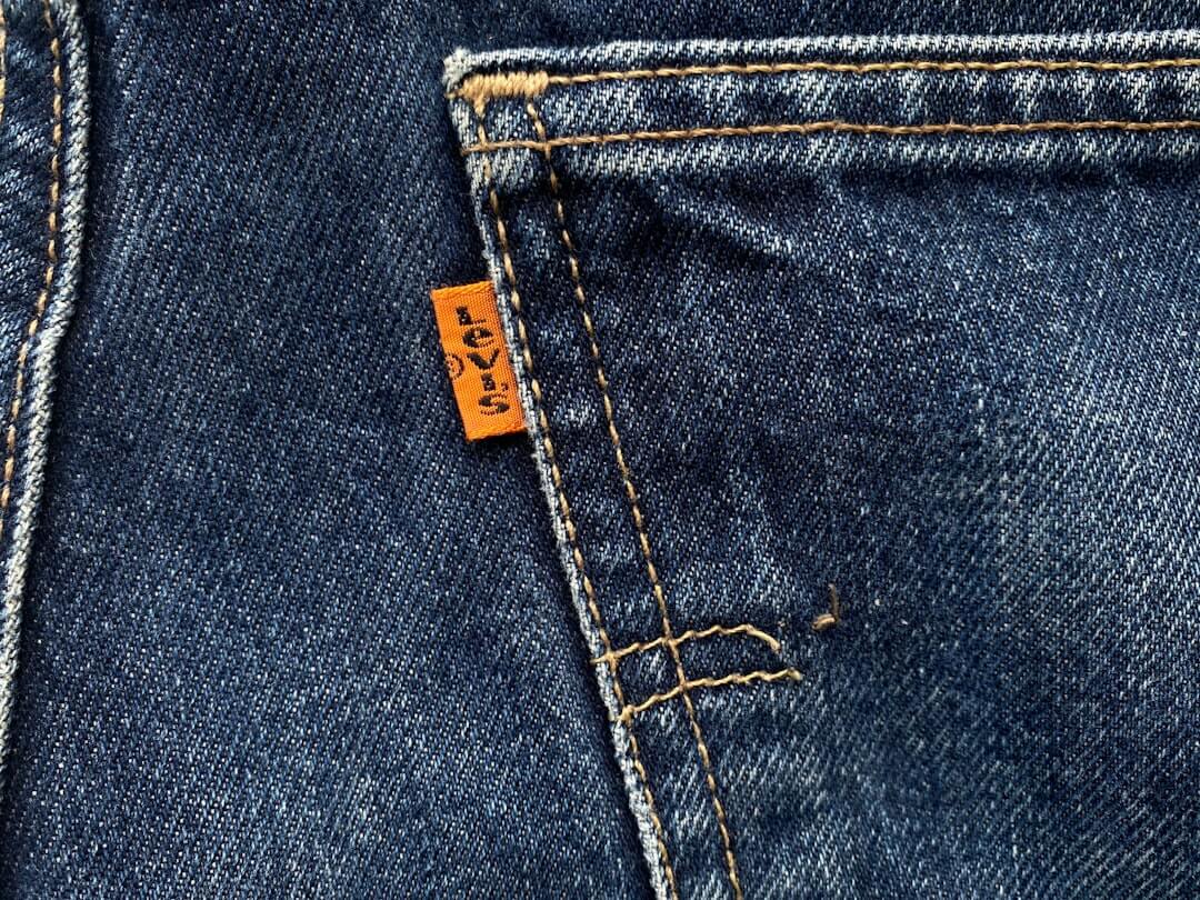irregular high-waist A-line denim trousers
