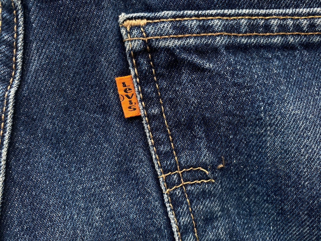 irregular high-waist A-line denim trousers
