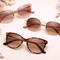 Women's glasses collection featuring stylish cat-eye and round sunglasses with floral accents.