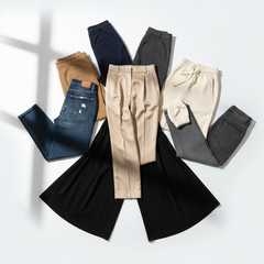 Assorted bottoms including jeans, dress pants, and joggers arranged in a circular layout.