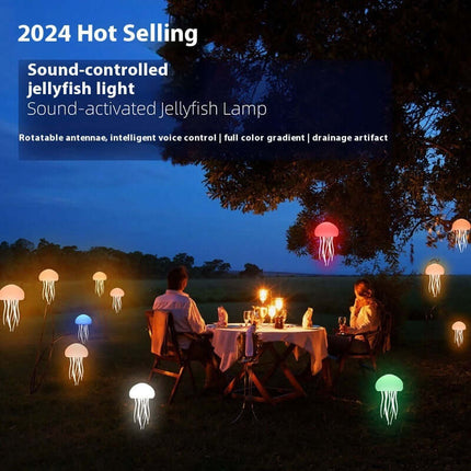 Smart LED Jellyfish Mood Lamp and Night Light illuminating an outdoor gathering with various colorful jellyfish lights.