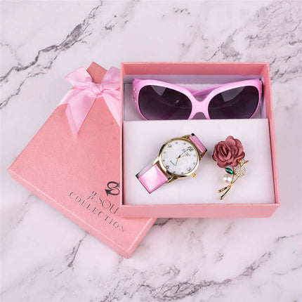 3-Piece Women's Quartz Watch & Sunglasses Gift Box Set in a pink gift box with sunglasses, watch, and floral accessory.