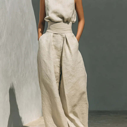 Casual Sleeveless Suit Summer Pullover Top Pants Set worn by a model in a minimalist setting, featuring a light-colored fabric.