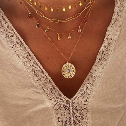 Geometric Disc Tassel Layered Necklace showing rhinestone details