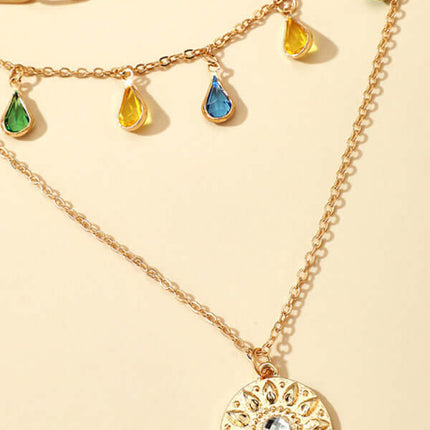 Geometric Disc Tassel Layered Necklace concave convex disc pendant detail