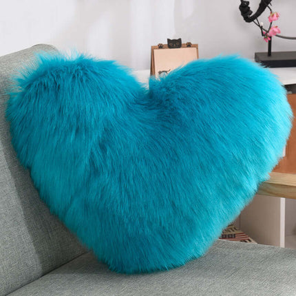 Heart Shaped Plush Throw Pillow being held by a woman
