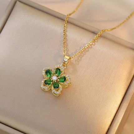 Ins Rhinestones Flowers unique rotatable necklace pendant with green flower design on gold chain.