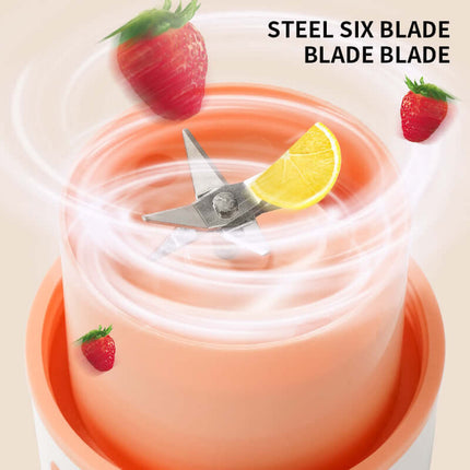 Steel six blade system in action with strawberries and lemon in Kitchen Electric Juicer USB Charging Wireless Blender.