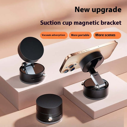 Magnetic Vacuum Suction Foldable Car Phone Holder displayed on a stylish surface, showcasing its modern design and functionality.