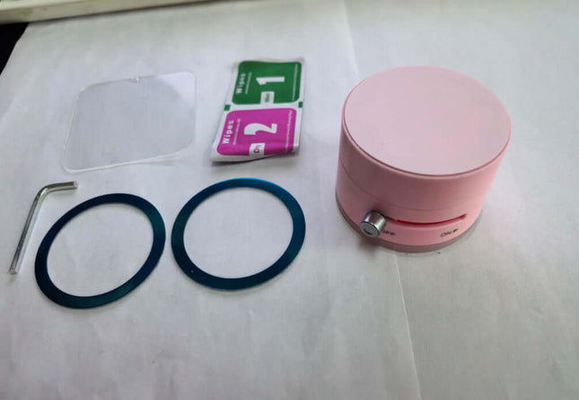 Magnetic Vacuum Suction Foldable Car Phone Holder components including suction device, stickers, and replacement rings.