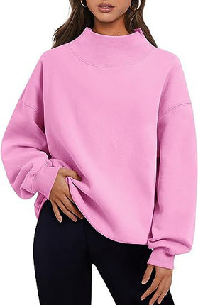 Pullover Sweatshirt Solid Color Loose Round Neck Hoodie in pink worn by a model, featuring a relaxed fit and long sleeves.