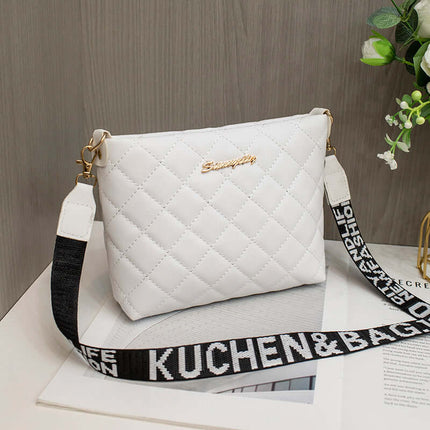 Small Messenger Bag Lingge Embroidery Shoulder Purse displayed with a stylish quilted design and adjustable strap.