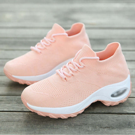 Sports Women Flying Knit Socks Shaking Shoes in light pink color with breathable knit design.