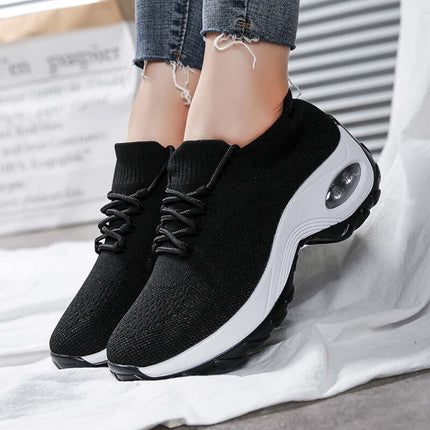 Sports Women Flying Knit Socks Shaking Shoes in black with stylish design and cushioning for comfort.