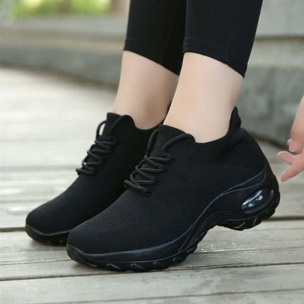 Sports Women Flying Knit Socks Shaking Shoes in black, designed for comfort and style during workouts.