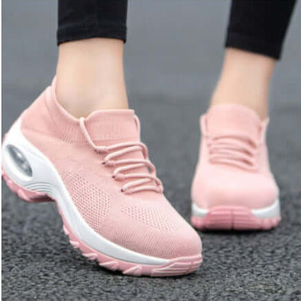 Sports Women Flying Knit Socks Shaking Shoes in pink color, featuring breathable mesh design and stylish silhouette.