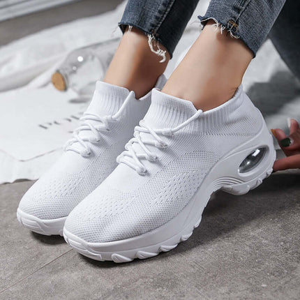 Sports Women Flying Knit Socks Shaking Shoes in white with breathable mesh design and air-cushioned sole.