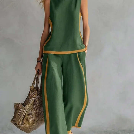 Summer Suits Sleeveless Vest And Wide Leg Pants Set in green with yellow trim, model carrying a bag.