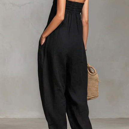 Women Strapless Ruched Jumpsuit Summer Fashion worn by model from the back, featuring a relaxed fit and stylish design.
