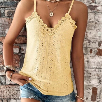 Women V Neck Lace Sling Vest Top Slim Fit Camisole in yellow worn with denim shorts against a brick background.