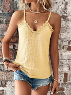 Women V Neck Lace Sling Vest Top Slim Fit Camisole in yellow worn with denim shorts against a brick background.