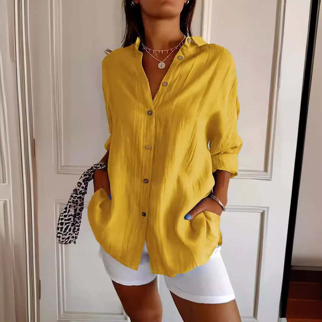 Womens Lapel Long Sleeve Single Breasted Pleated Shirt in yellow, featuring buttons and pockets, styled with white shorts.
