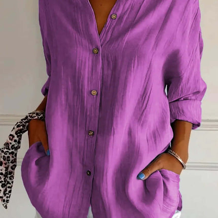 Womens Lapel Long Sleeve Single Breasted Pleated Shirt in purple with button closure and pockets, worn casually.