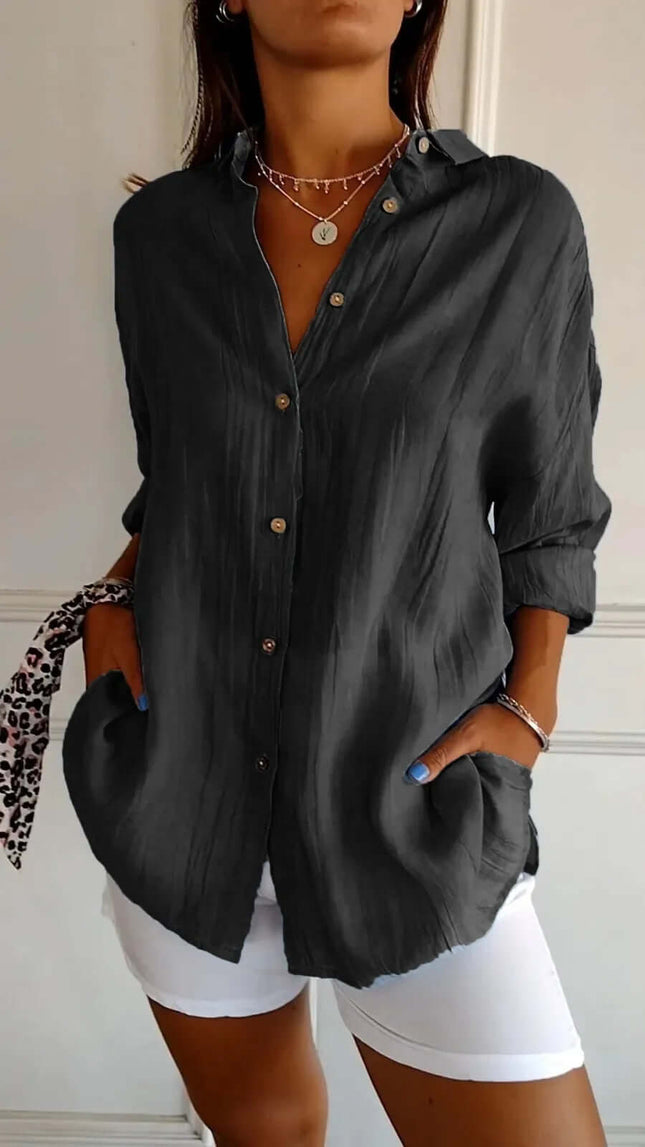 Womens Lapel Long Sleeve Single Breasted Pleated Shirt in dark gray worn with white shorts, showcasing a casual and stylish look.