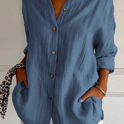 Womens Lapel Long Sleeve Single Breasted Pleated Shirt in blue, featuring buttons and pockets, styled with white shorts.
