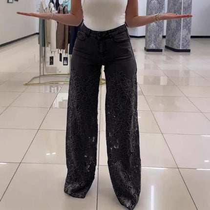 Y2K Lace Flowers Hollow High Waist Wide Leg Jeans displayed in a retail setting with a model showcasing the design.