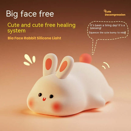Cute Rabbit LED Night Light Soft Silicone Touch Lamp with cute design and soft texture for relaxation.