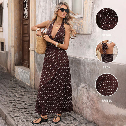 Casual Dot Slim V-neck Long Dress worn by a model on a street, showcasing its vintage A-line style and polka dot design.