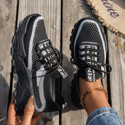 Comfortable Womens Flyknit Sneakers Breathable Walking Shoes model wearing sneakers for gym