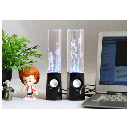 Dancing Water Speaker LED Light Fountain Speaker Party displayed beside a plant and laptop, featuring colorful water jets.