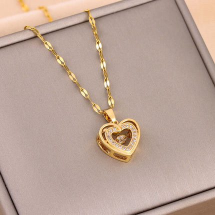 Double-layer Love Necklace With Rhinestones Pendant displayed against a plush background, featuring a gold heart-shaped pendant.