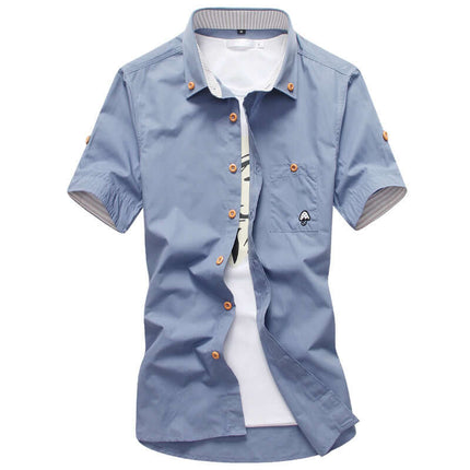 aaaabc8b777bd97415ed331846b2a779Embroidery Mens Shirts premium colorful palette options displayed together inside a luxury clothing boutique store