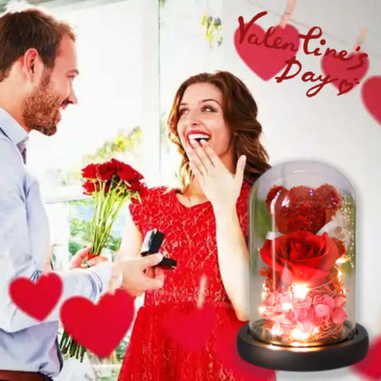 Eternal Rose Bear in Glass Dome with pink flower and wooden base.