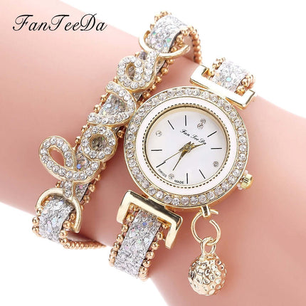 FanTeeDa Women Bracelet Watch Rhinestones Fashion Clock alloy case round shape.
