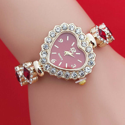 Fashion Love Shape Bracelet Watch Set Heart Diamond Gift featuring a gold heart-shaped watch with rhinestones and red accents.