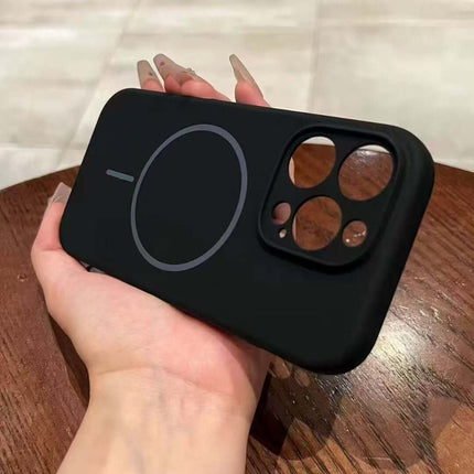 Fine Circle Magnetic Liquid Silicone Phone Case in hand, showcasing a sleek black design with circular magnetic feature.