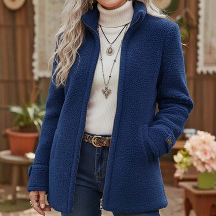 Fleece Zip-Up Jacket Women's Stand Collar Loose Outerwear in navy blue, worn with a white turtleneck and layered necklaces.
