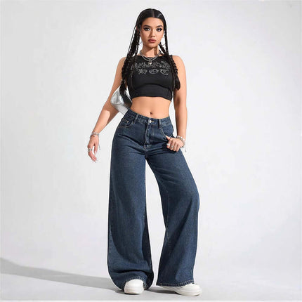 Model wearing Floor Length Flared Straight Leg Denim Jeans For Women with a black crop top and white sneakers.