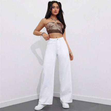 Floor Length Flared Straight Leg Denim Jeans For Women in white worn by a model with a brown crop top and stylish accessories.