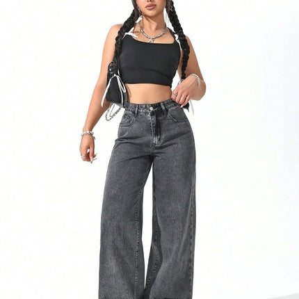 Floor Length Flared Straight Leg Denim Jeans For Women worn by a model with braided hair and a crop top.