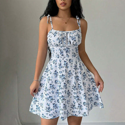 Floral Print Summer Sweet A Line Mini Dress worn by a model, featuring a white base with blue floral patterns, perfect for summer.