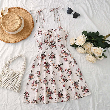 Floral Print Summer Sweet A Line Mini Dress with a straw hat, sunglasses, and white roses on a white background.