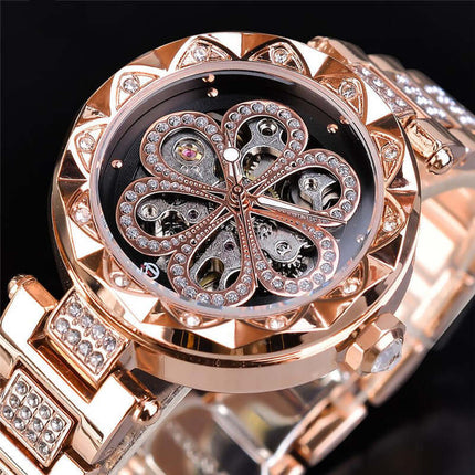 Forsining Mechanical Automatic Ladies Luxury Watch with sparkling design and intricate butterfly-shaped movement.