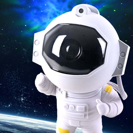 Galaxy Star Projector astronaut-themed night light with adjustable arm and detachable base on a moon surface.