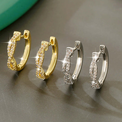 Geometric Braided Copper Hoops Luxury Gold Silver Earrings displayed in a stylish arrangement, showcasing gold and silver options.