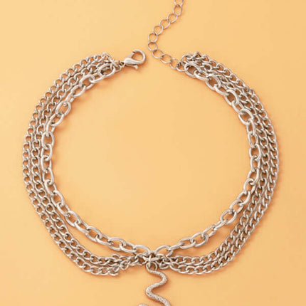 Gold Heart Snake Charm Tassel Layered Anklet Set for Women display